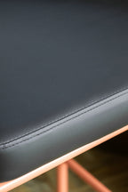 Black and Pink Roll Back Bar Stool