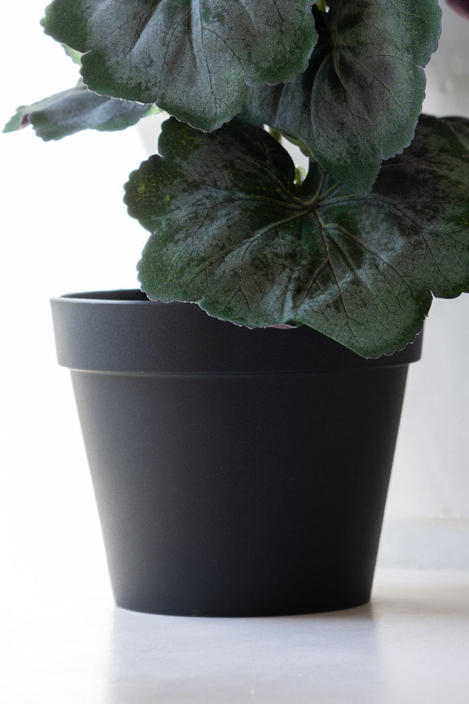 Faux géranium rouge en pot